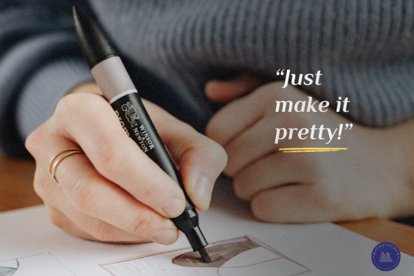 Person sketching website design emphasizing that pretty design must be paired with functional solutions